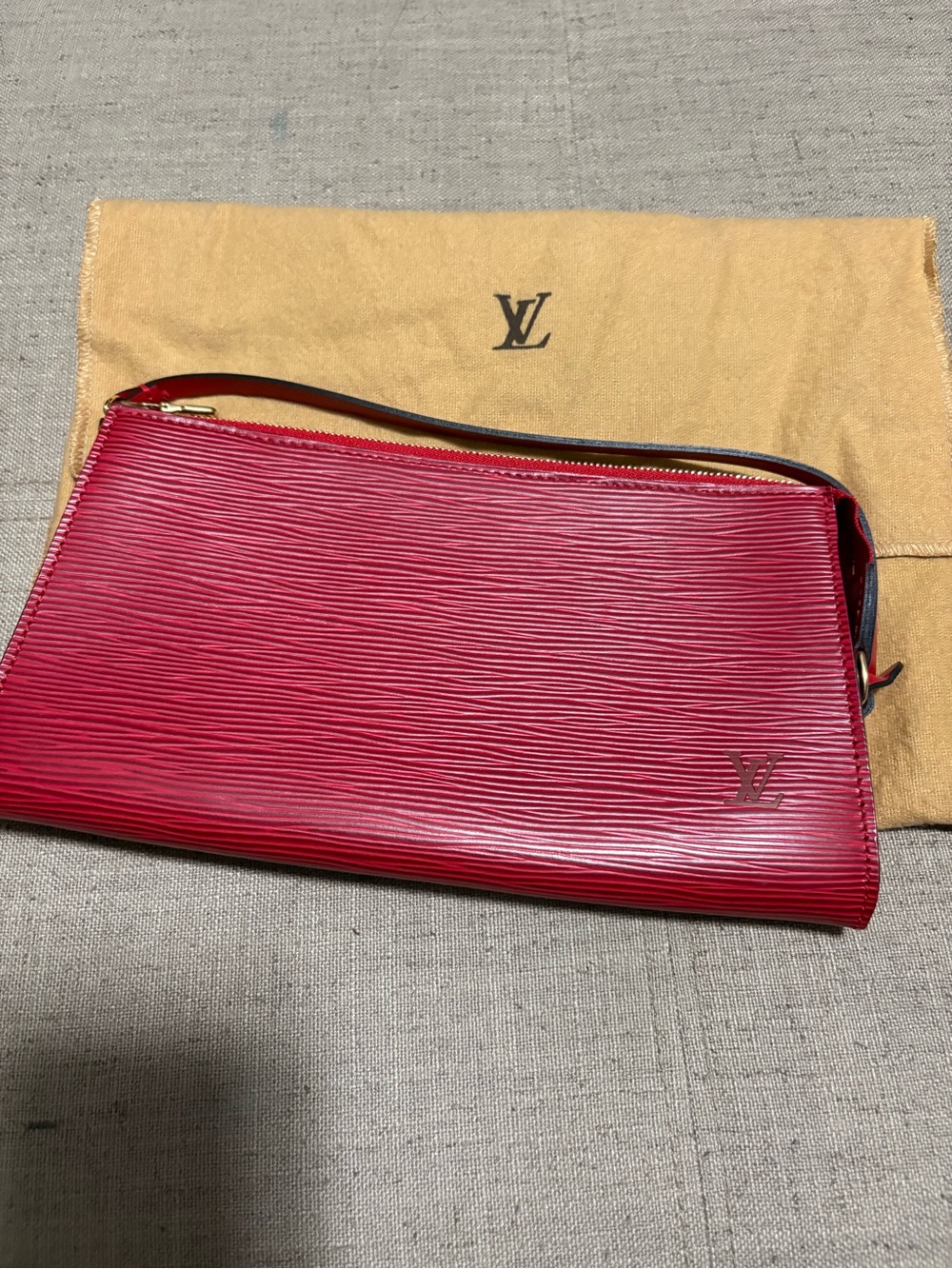 Authenticated Louis Vuitton Red Epi Leather Pochette